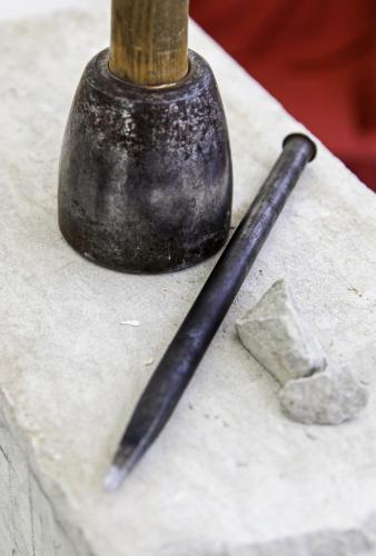Ancient stone tools to carve by hand
